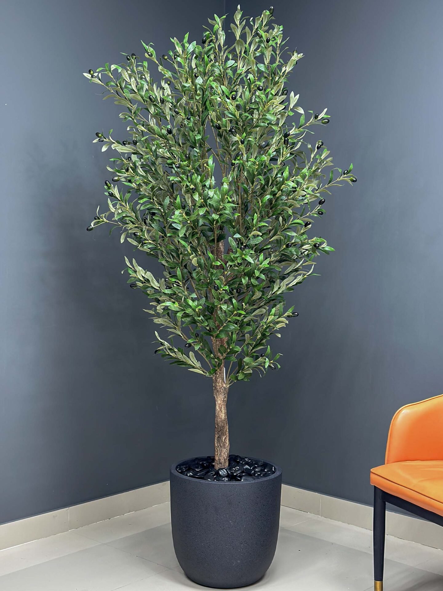 Elevate your interior with our gorgeous Artificial Olive Tree. Enjoy the charm of nature in your home or workspace all year round!