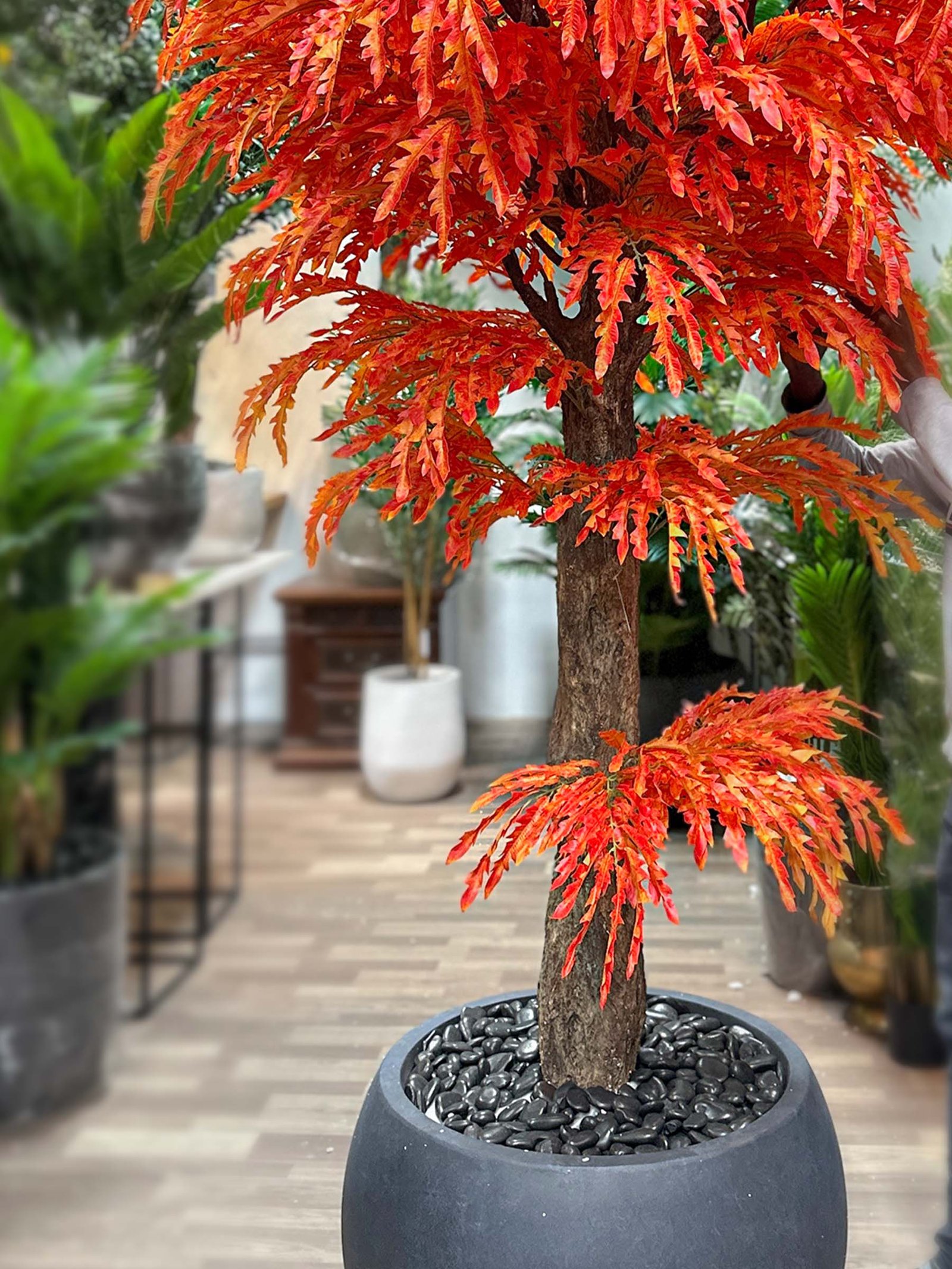 9734(2) Enhance your decor with our lifelike Artificial Decorative Tree with Orange Autumn Leaves. Its vibrant colors will bring warmth to any setting. Shop now!