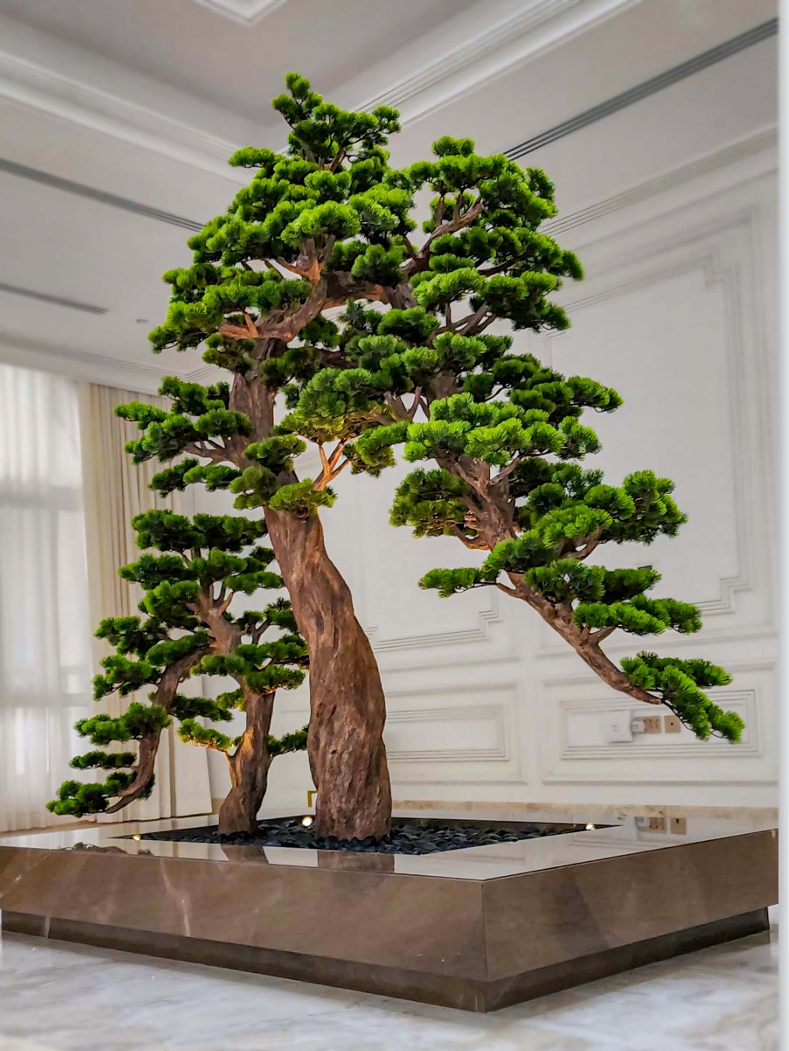 9631(1) Elevate your space with this stunning Artificial Bonsai Tree! Its realistic design and stylish pot will bring everlasting beauty to any setting.