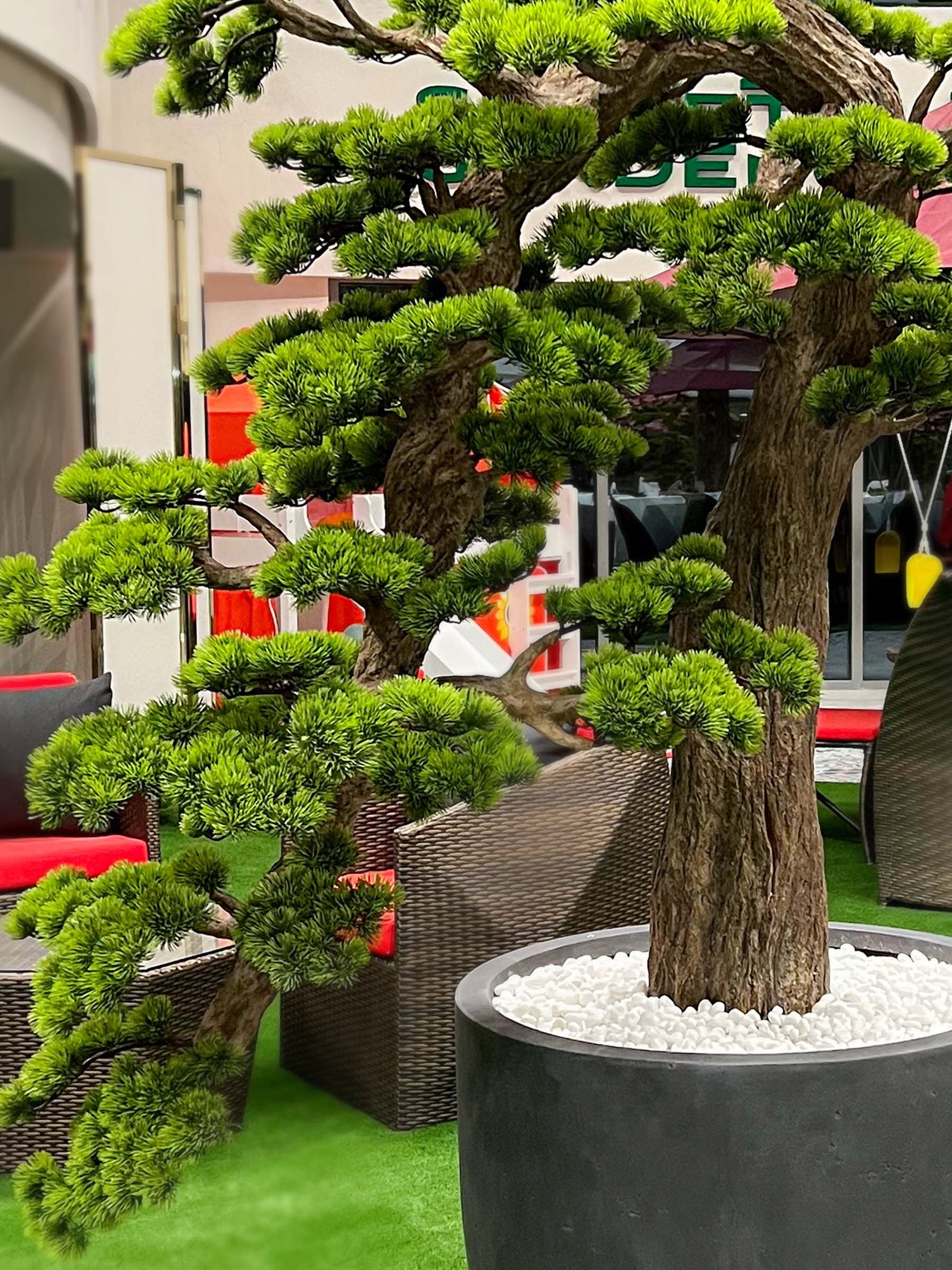 Elevate your space with this stunning Artificial Bonsai Tree! Its realistic design and stylish pot will bring everlasting beauty to any setting.