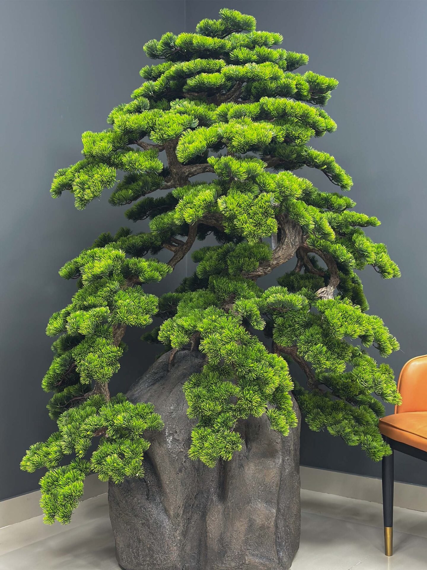 Elevate your space with this stunning Artificial Bonsai Tree! Its realistic design and stylish pot will bring everlasting beauty to any setting.