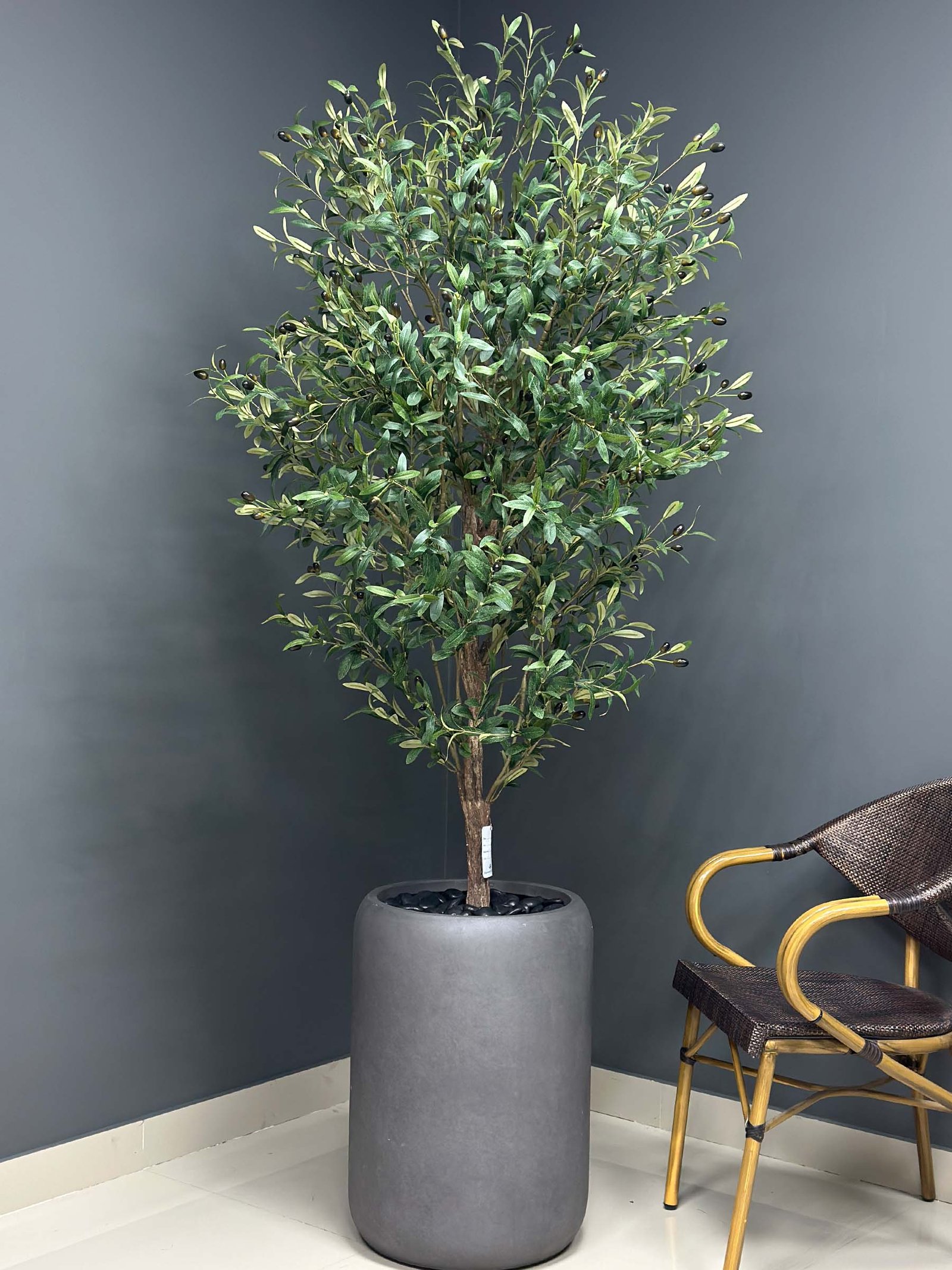 9702 Elevate your interior with our gorgeous Artificial Olive Tree. Enjoy the charm of nature in your home or workspace all year round!