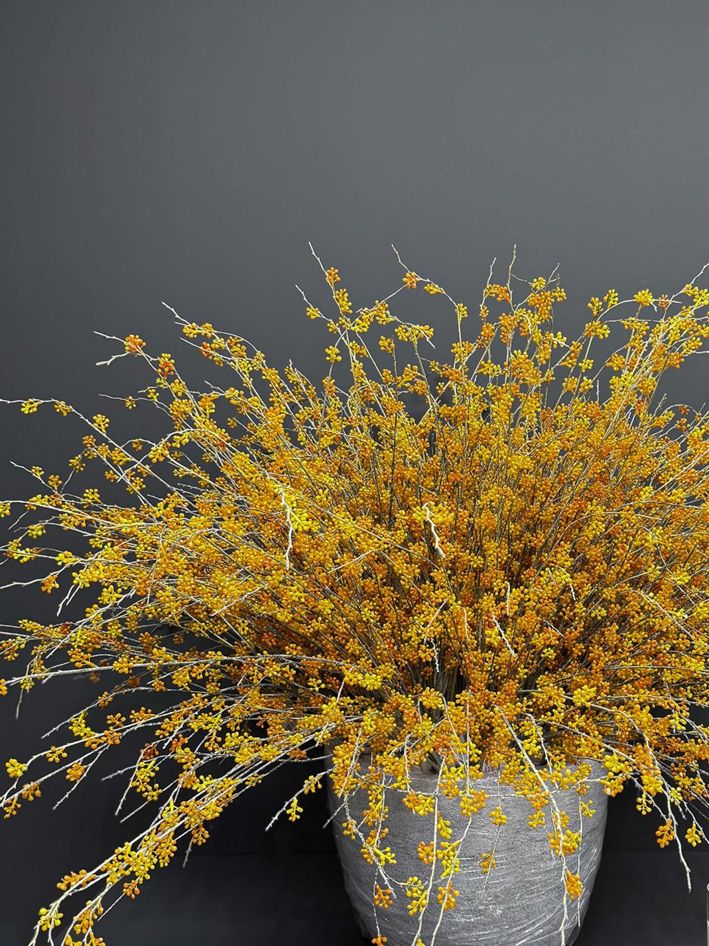 Add a touch of elegance to your space with the Artificial Accessories Golden - Grey Pot. Embrace everlasting beauty that requires no care!