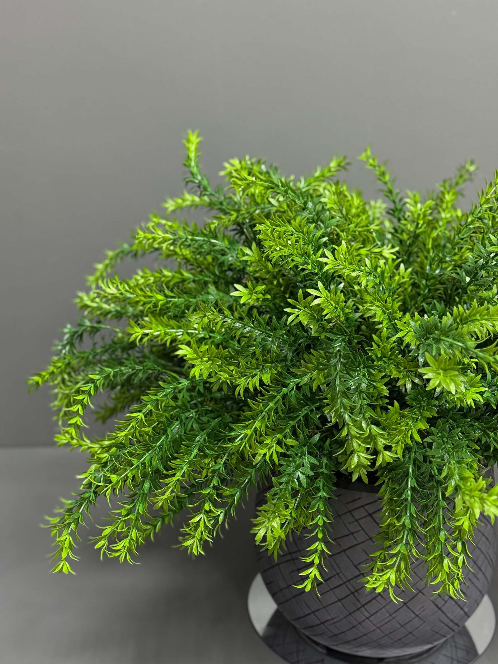 ar57-1 Transform your space with our Artificial Greenery Arrangement in Textured Grey Pot, featuring vibrant and lively shades of green. Enhance your decor today!